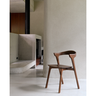 The Bok Dining Chair from Ethnicraft in a lounge area.