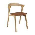 The Bok Dining Chair from Ethnicraft in oak with cognac leather upholstery.