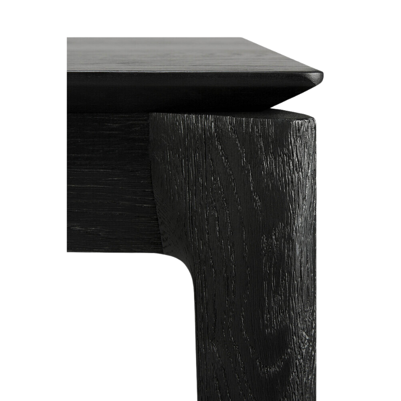 The Bok Dining Table from Ethnicraft in black oak, close up.