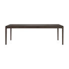 The Bok Dining Table from Ethnicraft in brown oak, 94.5 inch size.
