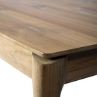 The Bok Dining Table from Ethnicraft in teak, in a detailed close up shot.