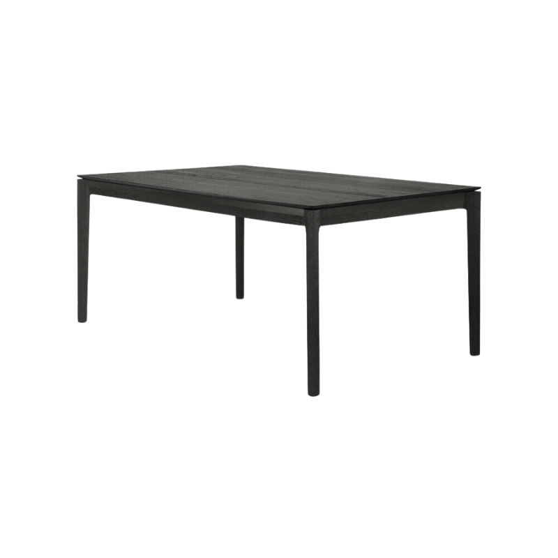 The Bok Extendable Dining Table from Ethnicraft in black oak which extends from 63 to 96 inches.