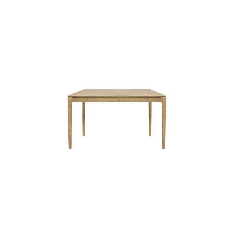 The Bok Extendable Dining Table from Ethnicraft in oak which extends from 55 to 87 inches.