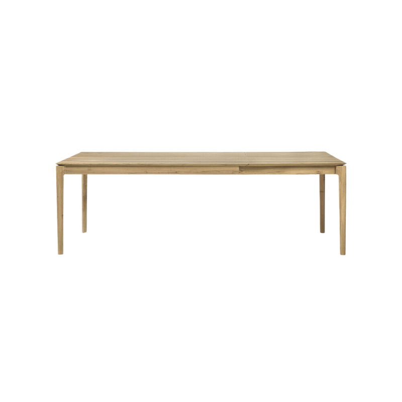 The Bok Extendable Dining Table from Ethnicraft in oak which extends from 63 to 94.5 inches.