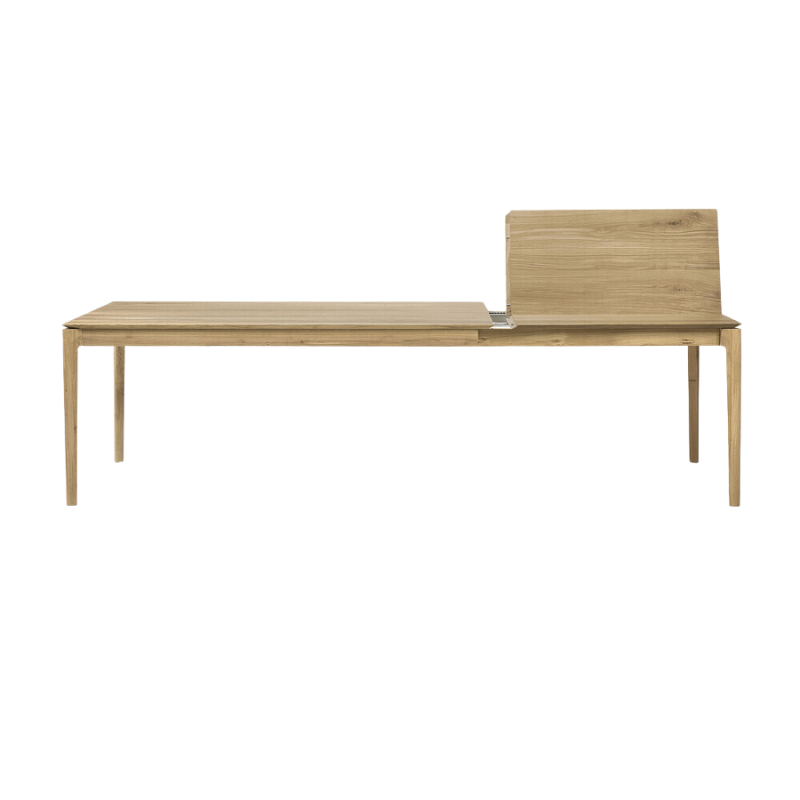 The Bok Extendable Dining Table from Ethnicraft in oak which extends from 71 to 110 inches.