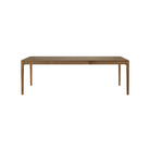 The Bok Extendable Dining Table from Ethnicraft in teak which extends from 63 to 94.5 inches.