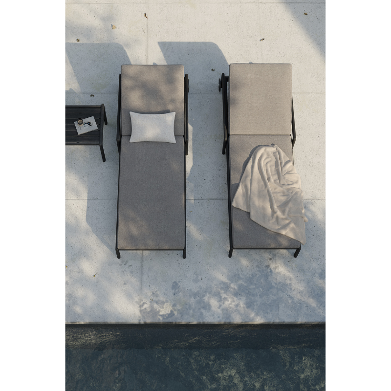 The Boucle Rectangular Outdoor Cushion from Ethnicraft in an outdoor family space.