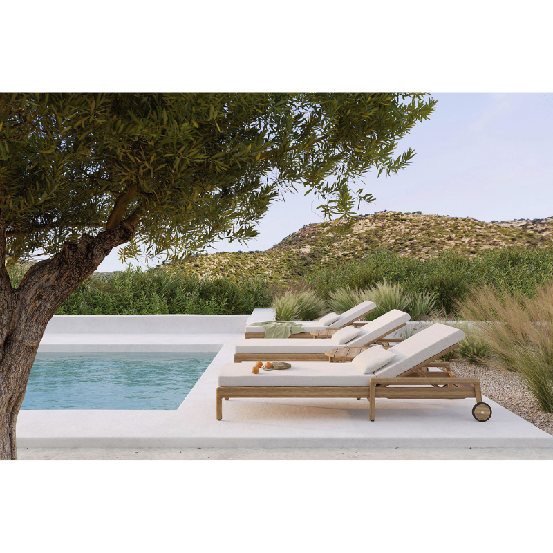 The Boucle Rectangular Outdoor Cushion from Ethnicraft poolside.