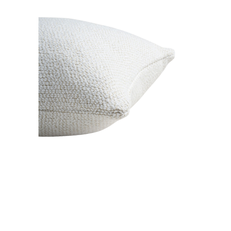 The Boucle Rectangular Outdoor Cushion from Ethnicraft in white, in a detailed photograph.