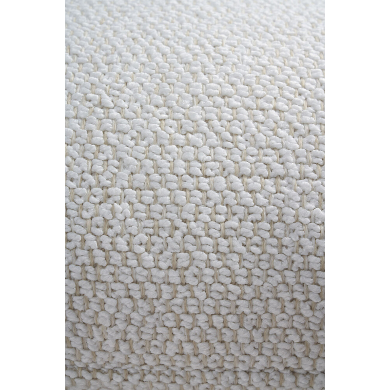 The fabric swatch for the Boucle Rectangular Outdoor Cushion from Ethnicraft in white.