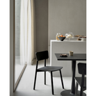 The Casale Dining Chair from Ethnicraft in a family space.