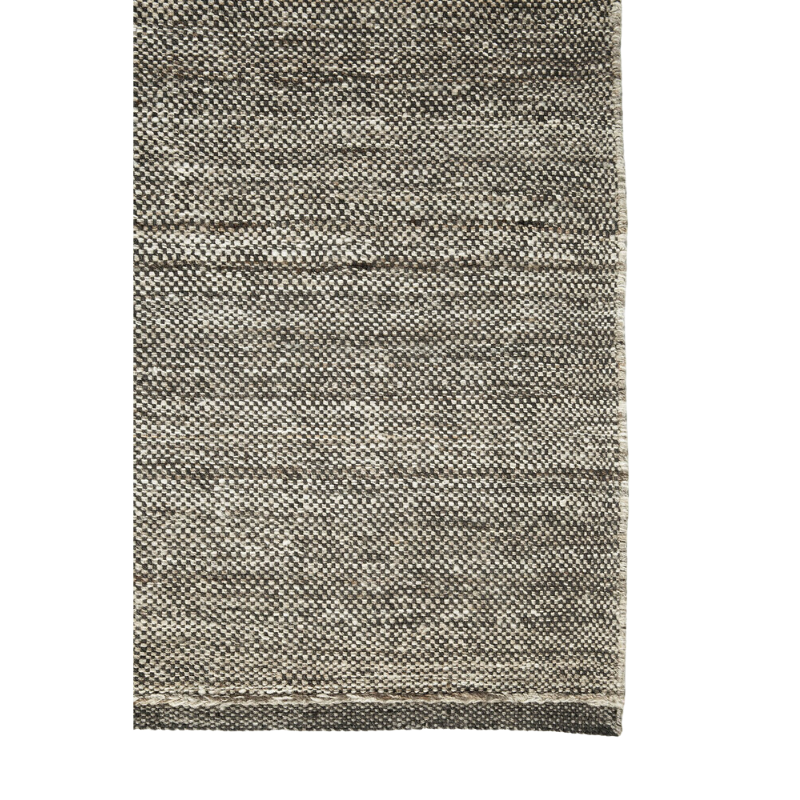 The Checked Kilim Rug from Ethnicraft made from 100% wool in a detailed shot.