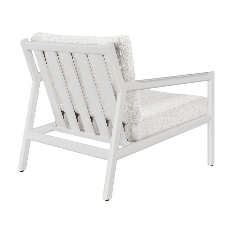 The Jack Outdoor Lounge Chair from Ethnicraft made from aluminum with the off white cushion.