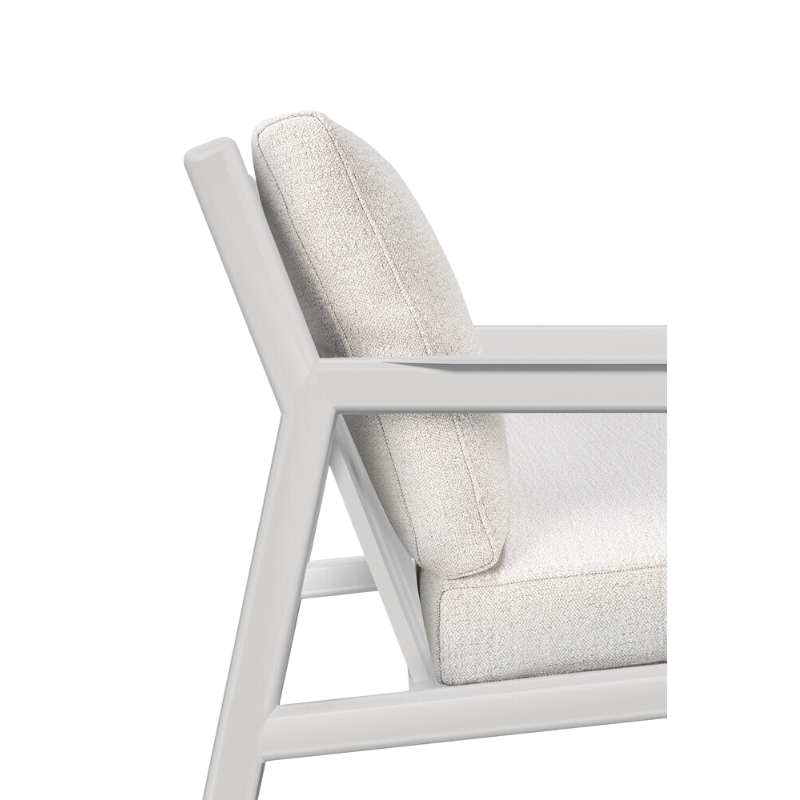 The Jack Outdoor Lounge Chair from Ethnicraft made from aluminum with the off white cushion.
