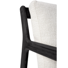 The Jack Outdoor Lounge Chair from Ethnicraft made from solid teak tainted and brushed black with the off white cushion.