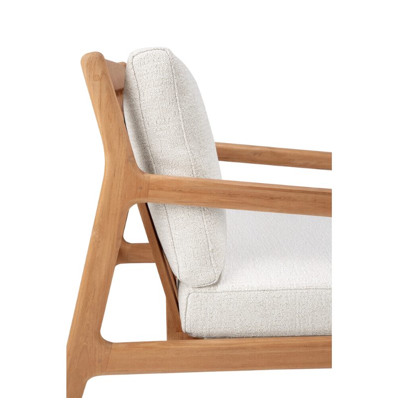 The Jack Outdoor Lounge Chair from Ethnicraft made from solid teak with the off white cushion.