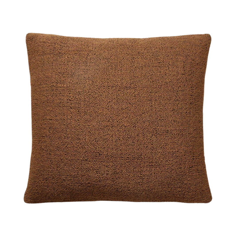 The Nomad Square Outdoor Cushion from Ethnicraft in marsala.