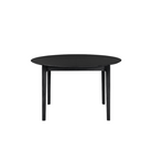 The Round Bok Extendable Dining Table from Ethnicraft in solid oak, tainted black.