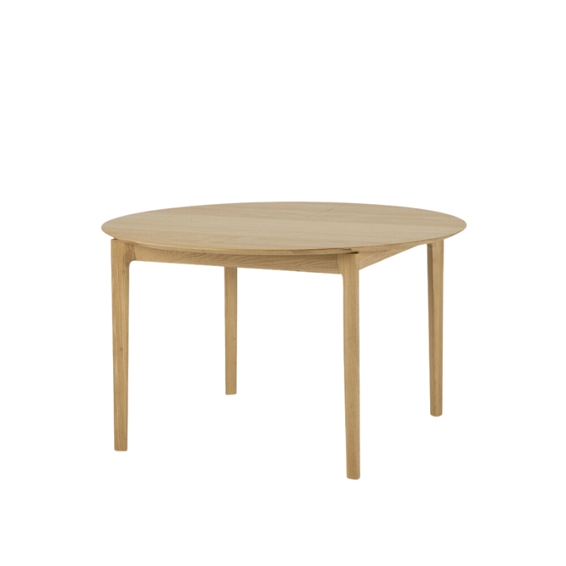 The Round Bok Extendable Dining Table from Ethnicraft in solid oak.