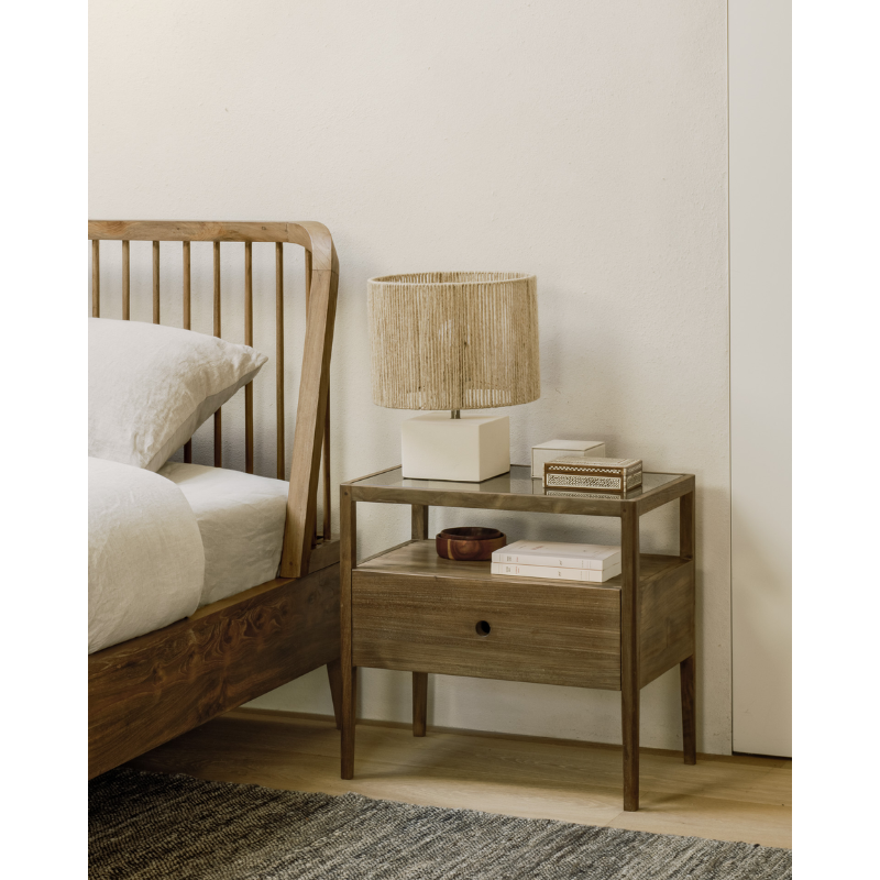 With its one drawer, open space and slightly tapered legs, the Spindle bedside table is the perfect no-nonsense companion for the striking Spindle bed.