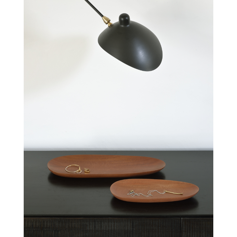 The Thin Oval Boards Set from Ethnicraft in a living room.