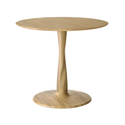 Airy with subtle complexities, the Torsion round dining table incorporates advanced woodworking techniques to create a light table top with a torsade base of sculptural elegance.