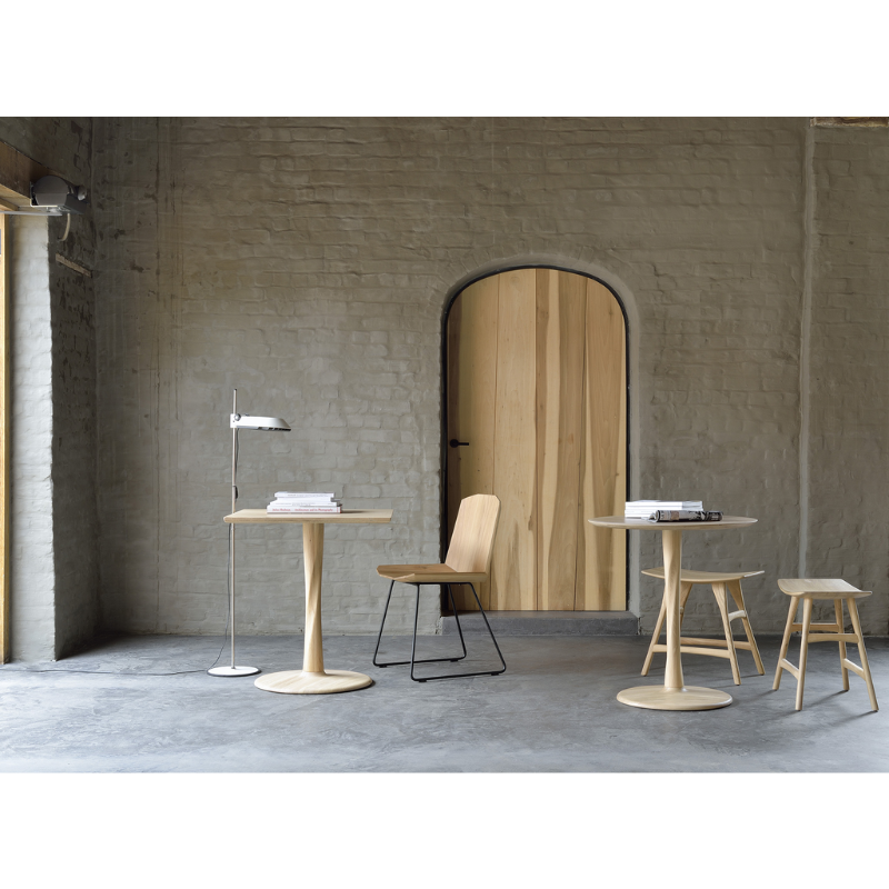 Airy with subtle complexities, the Torsion round dining table incorporates advanced woodworking techniques to create a light table top with a torsade base of sculptural elegance.