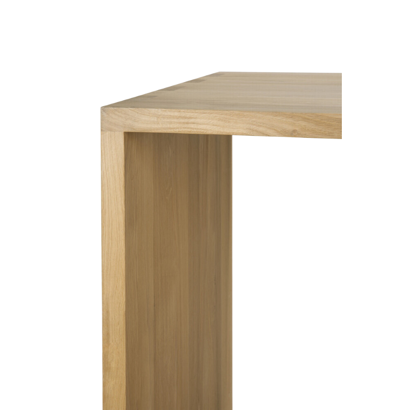 The U Desk from Ethnicraft in oak focusing on the corner.