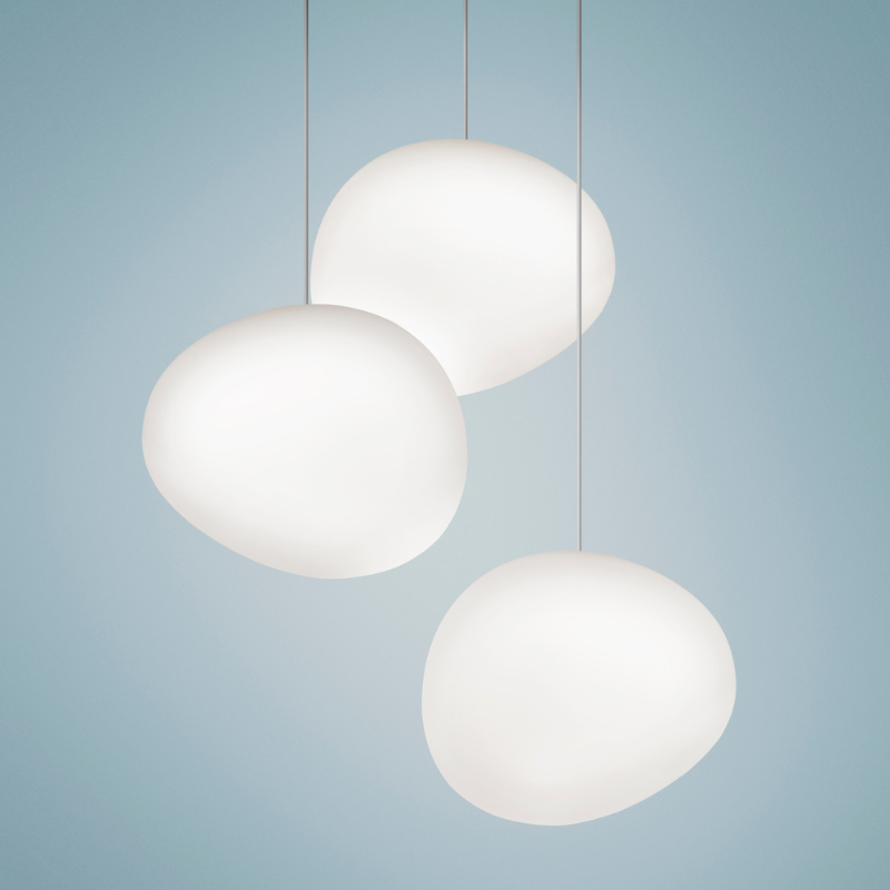 Three of the Gregg Suspension pendant lights from Foscarini on display.