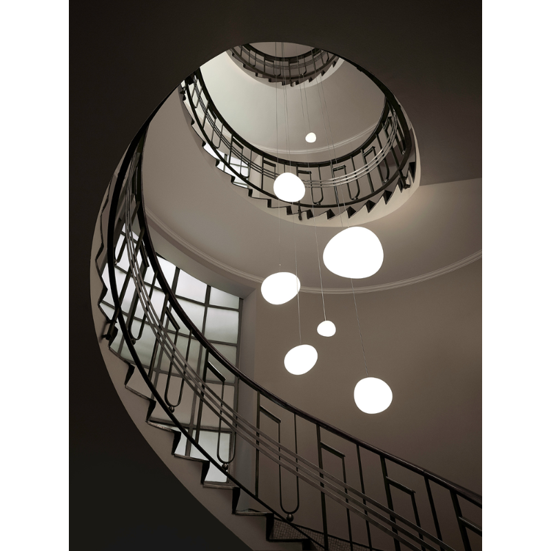 A variety of Gregg Suspension lights are used to illuminate this staircase.