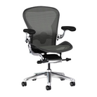 The Aeron Chair from Herman Miller with the adjustable lumbar support back support in graphite and polished aluminum.