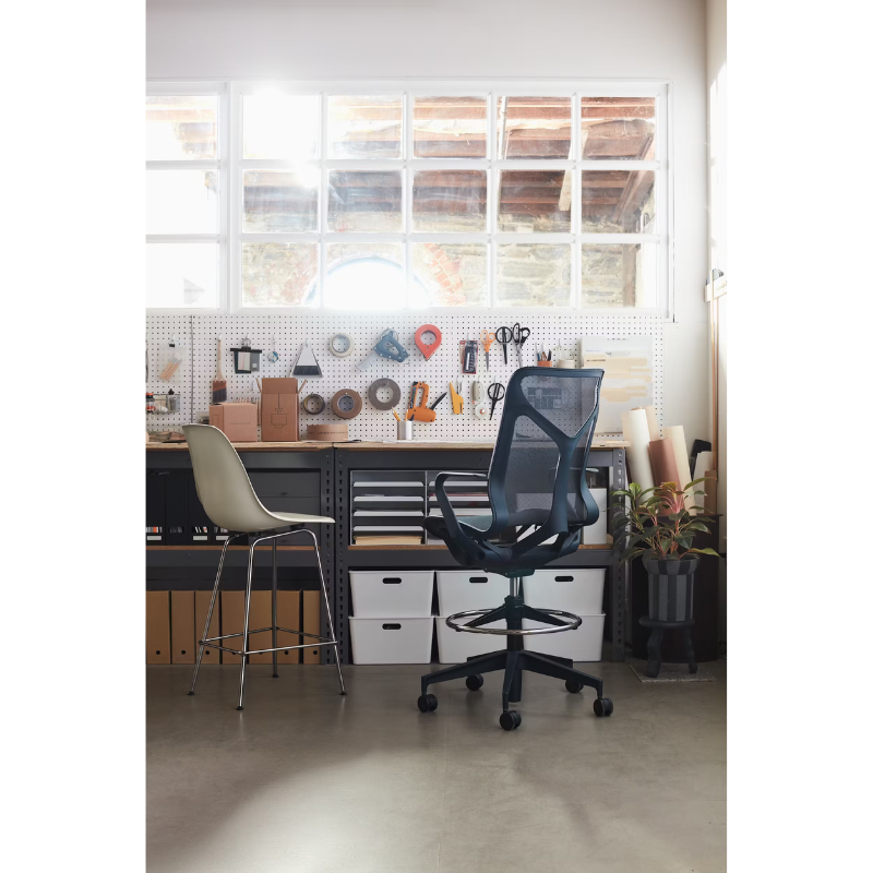 The Cosm Stool from Herman Miller in a home work shop lifestyle photograph.