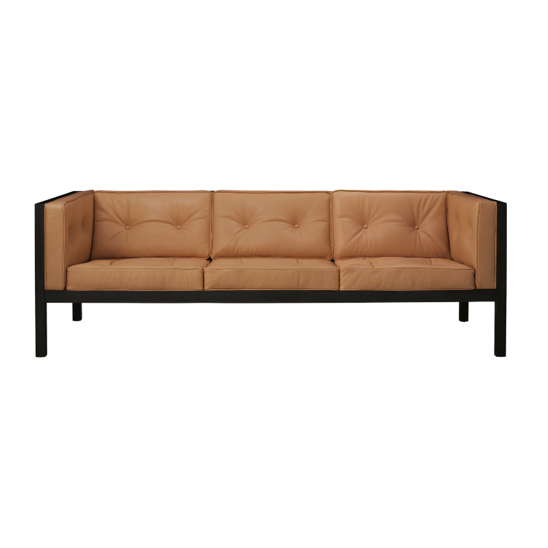 The 80 inch Cube Sofa from Herman Miller with the black stained oak frame and shore prone leather.