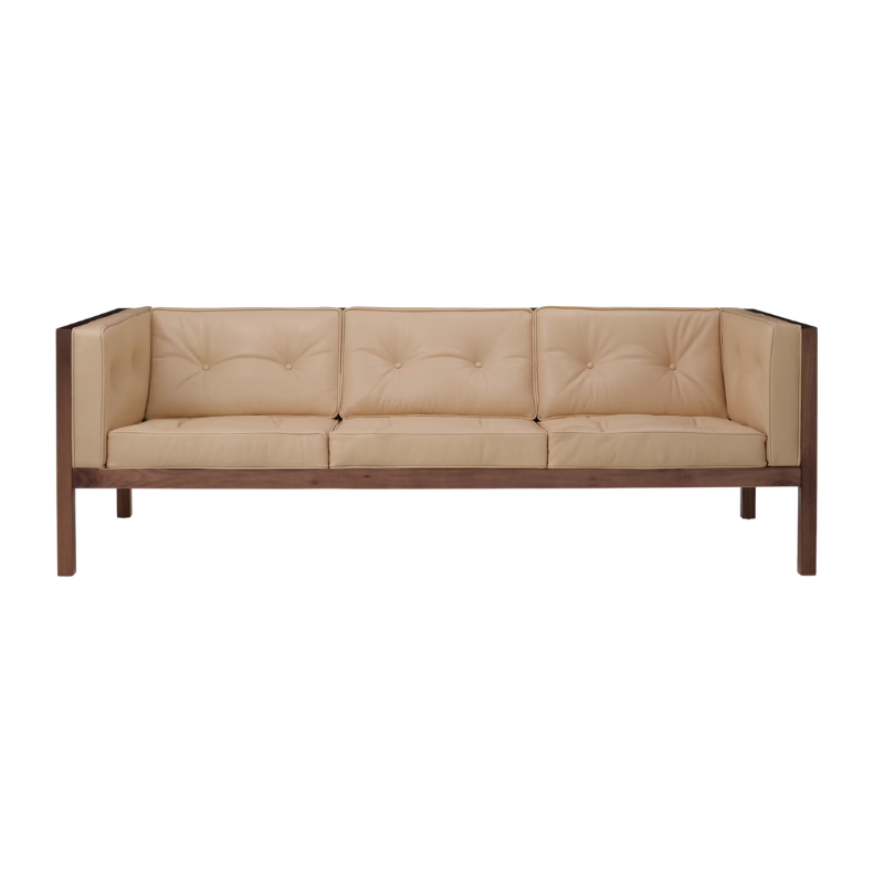 The 80 inch Cube Sofa from Herman Miller with the walnut frame and balsa prone leather.