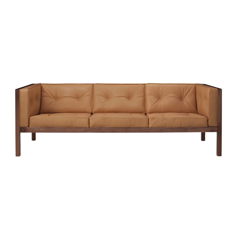 The 80 inch Cube Sofa from Herman Miller with the walnut frame and shore prone leather.