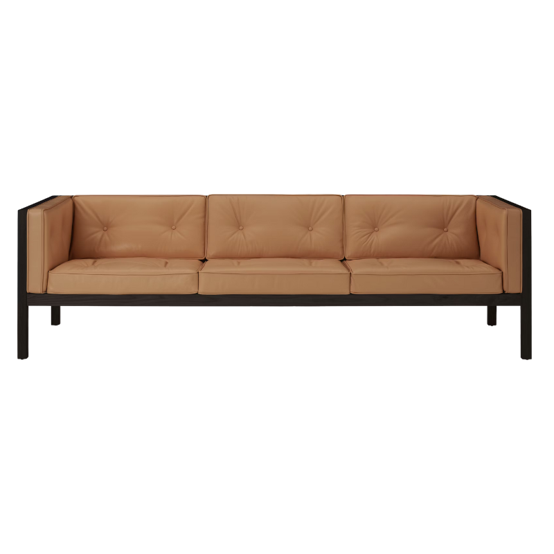 The 92 inch Cube Sofa from Herman Miller with the black stained oak frame and shore prone leather.