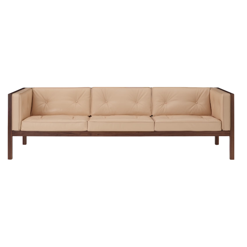 The 92 inch Cube Sofa from Herman Miller with the walnut frame and balsa prone leather.