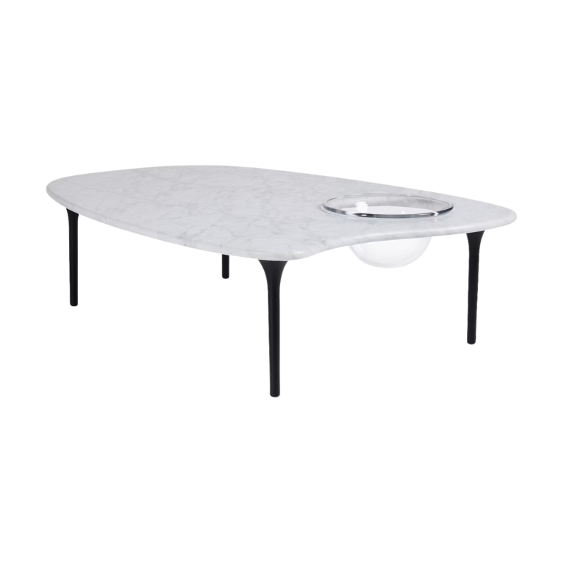 The Cyclade Table from Herman Miller in low, with a bowl, in carrara marble.