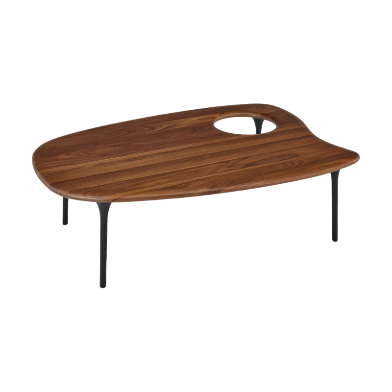 The Cyclade Table from Herman Miller in low, without a bowl, in walnut.