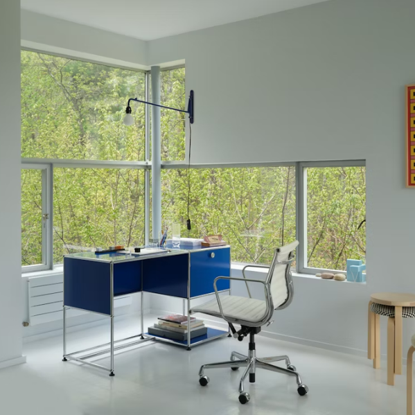The Eames Aluminum Group Chair, Executive from Herman Miller in a home.