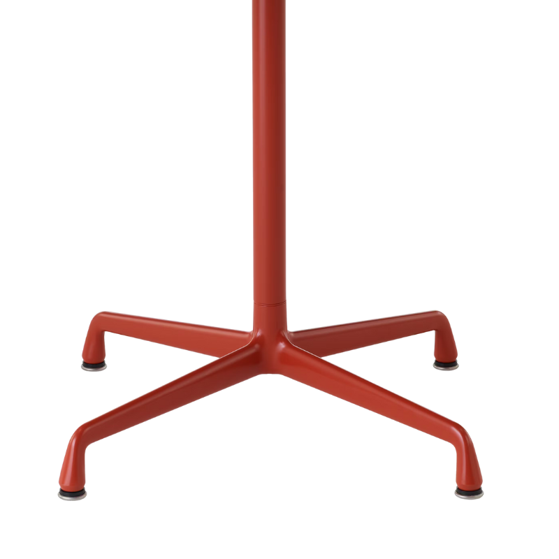 The Eames Dining Table from Herman Miller, designed by Herman Miller x Hay in iron red with a detailed photograph of the legs and base of the table.