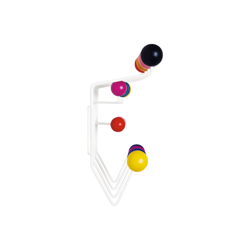 The Eames Hang-It-All, originally released in 1953, exemplifies the Eameses' belief in taking pleasure seriously. Made with a sturdy steel frame and solid wood balls, this colorful coat rack was created using the same technique for simultaneously welding wires that Charles and Ray developed for their low tables and wire chairs.