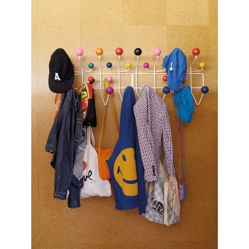 The Eames Hang-It-All from Herman Miller in a linear fashion being used for family accessories.