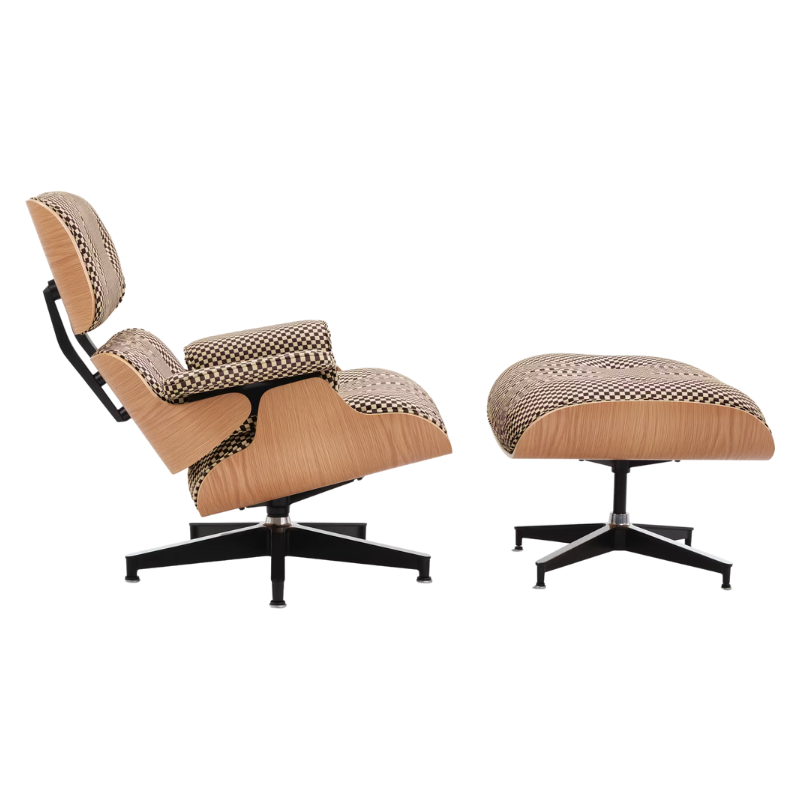 The Eames Lounge Chair and Ottoman from Herman Miller in black and white checker upholstery with the white oak shell.
