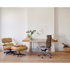 The Eames Lounge Chair and Ottoman from Herman Miller in a home office.