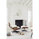 The Eames Lounge Chair and Ottoman from Herman Miller in a living room.
