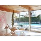 The Eames Lounge Chair and Ottoman from Herman Miller in a pool house.