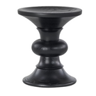 The Eames Turned Stool from Herman Miller made of ebony in shape B.