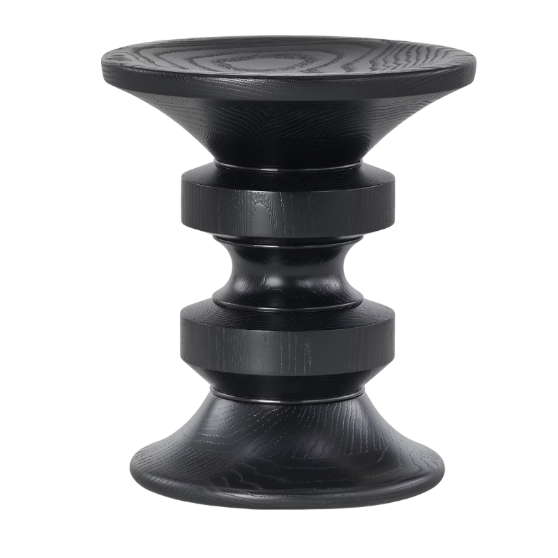 The Eames Turned Stool from Herman Miller made of ebony in shape D.