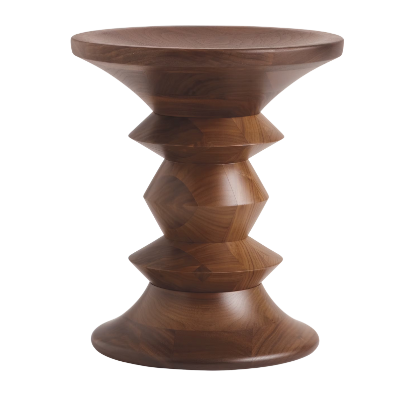 The Eames Turned Stool from Herman Miller made of walnut in shape C.